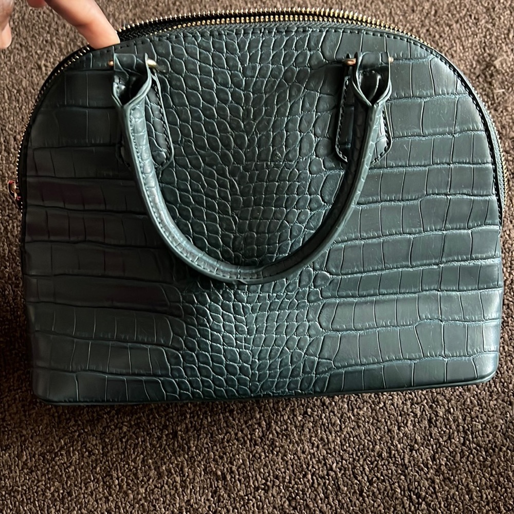 Selling a New, A New Day Purse.